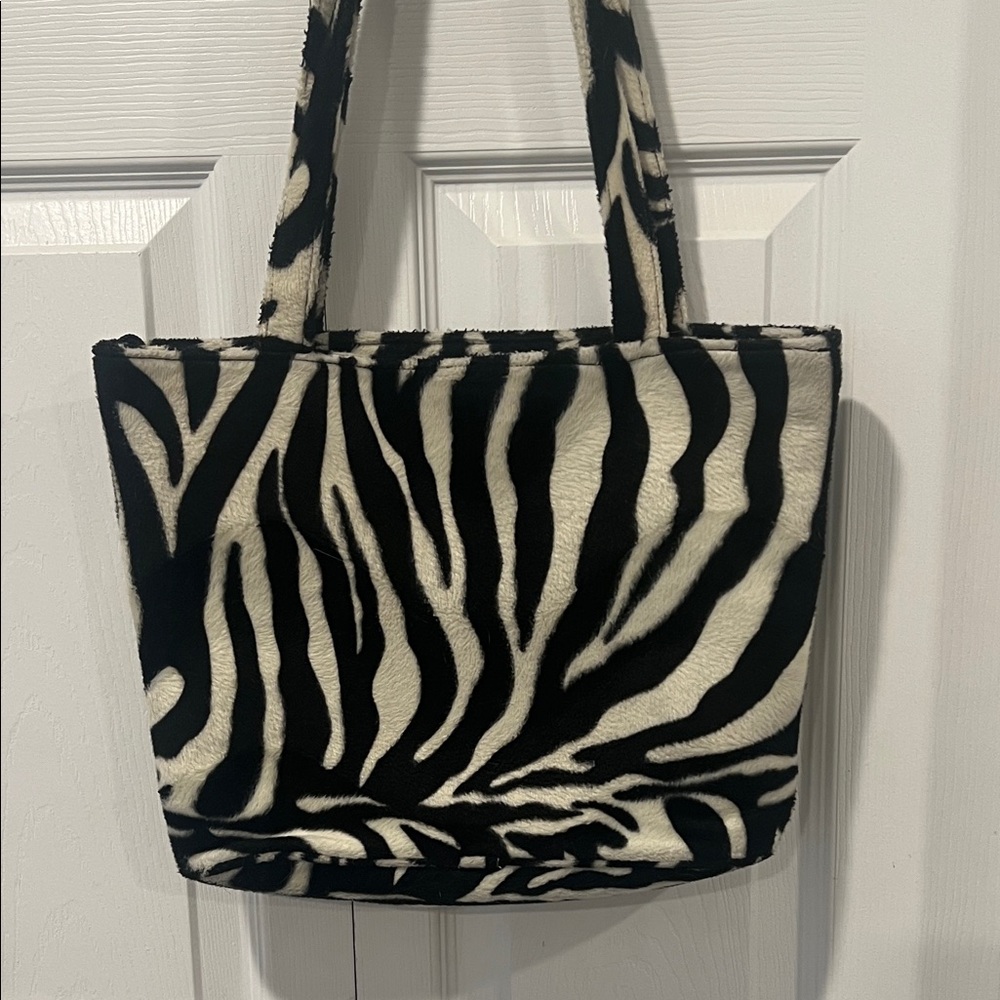 Loni Zebra Print Faux Fur Bag